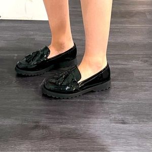 Lug sole loafers with tassels